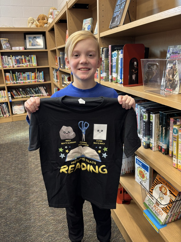 student with reading tshirt