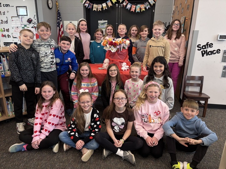 students with flowers