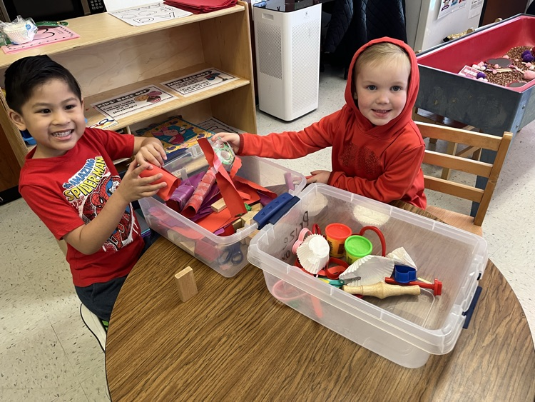 playing in valentine themed stem boxes