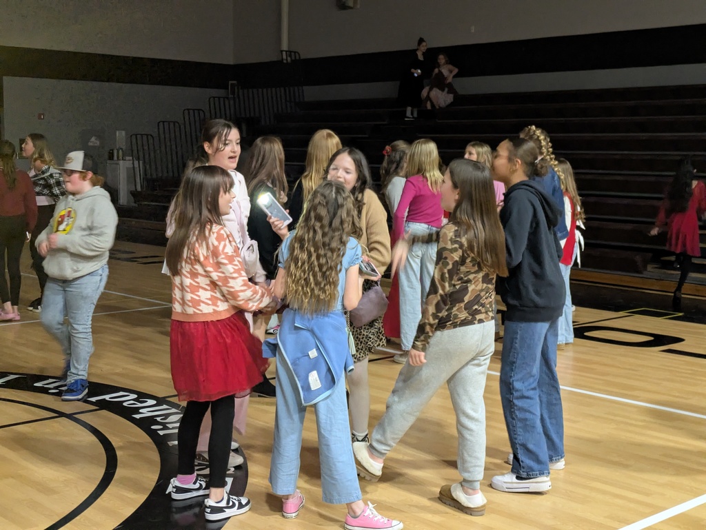 Students dancing in the gym.