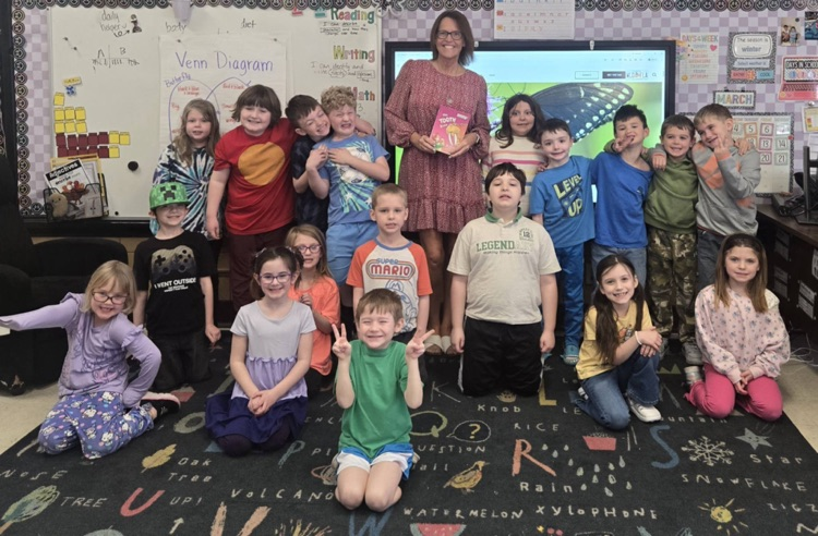 guest teacher reading to first grade students 