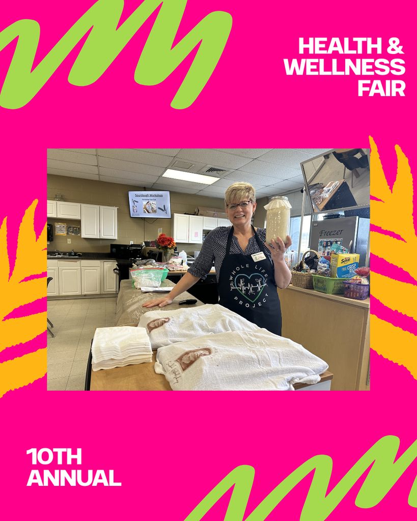 instructor with jar of sour dough in sour dough class