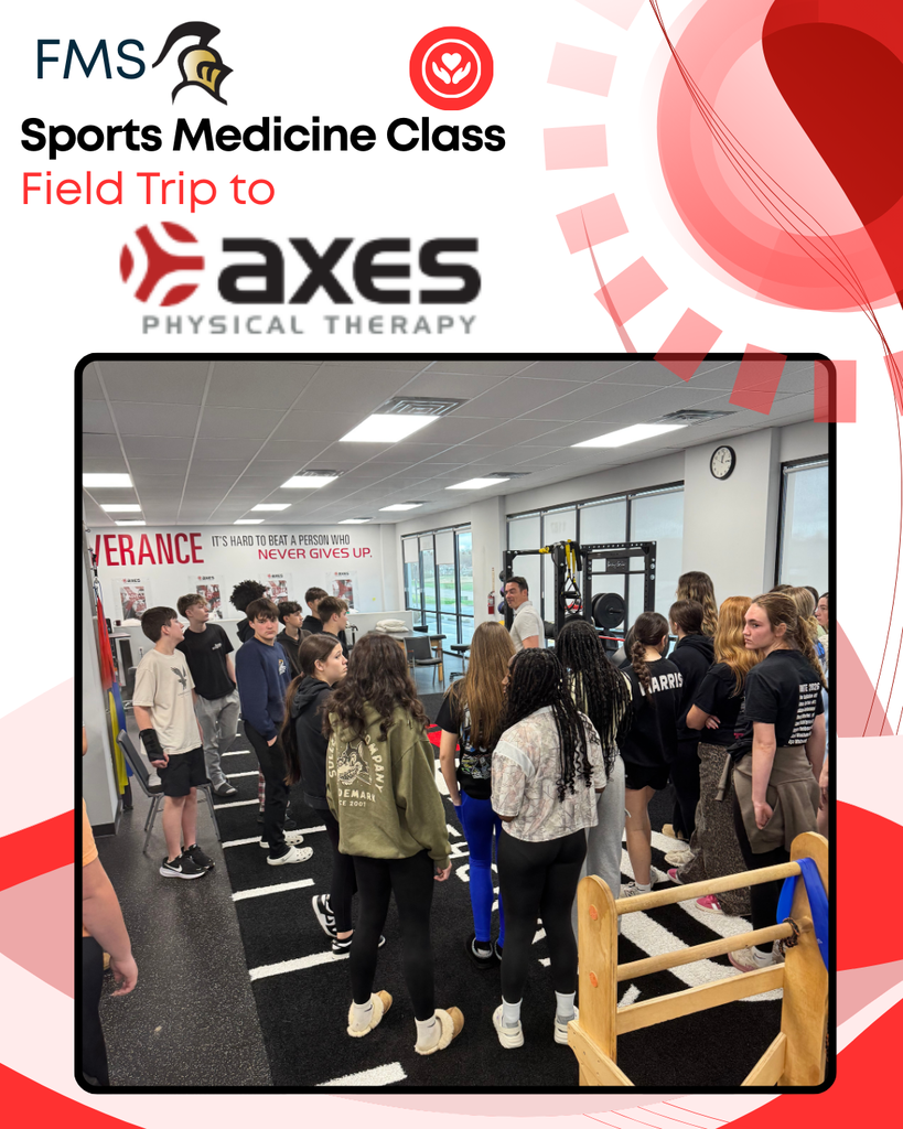 Students listening to a presentation at Axes