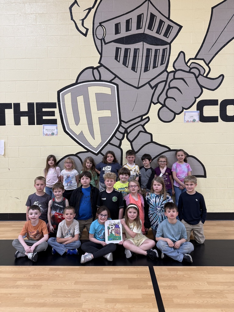 Mrs. Land's first grade students with their published book 