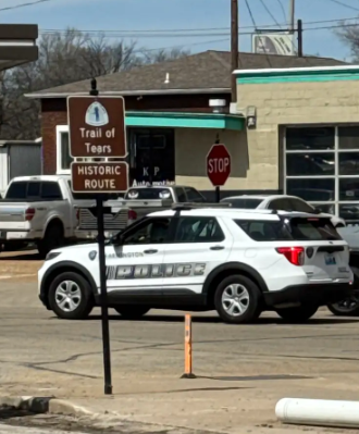 Officer Helton escorts the classes