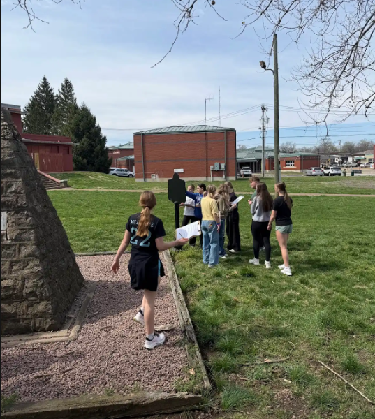 Students walk through Long Park