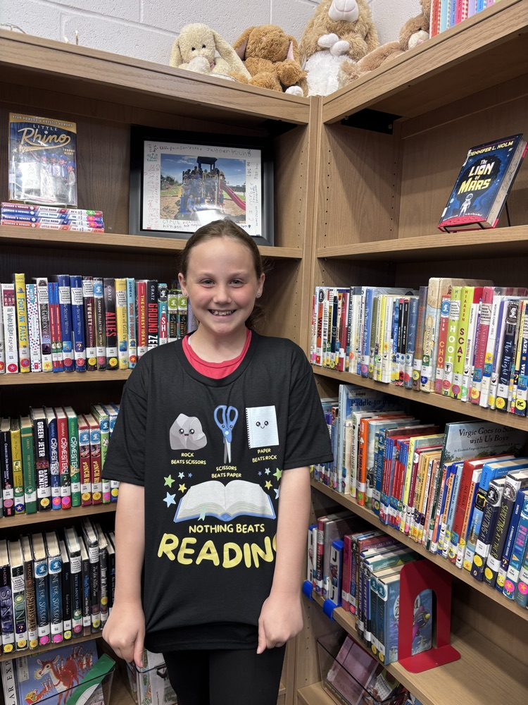 student in reading tshirt 