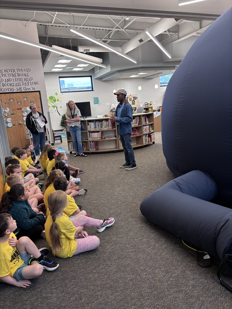 kids listening to presenter