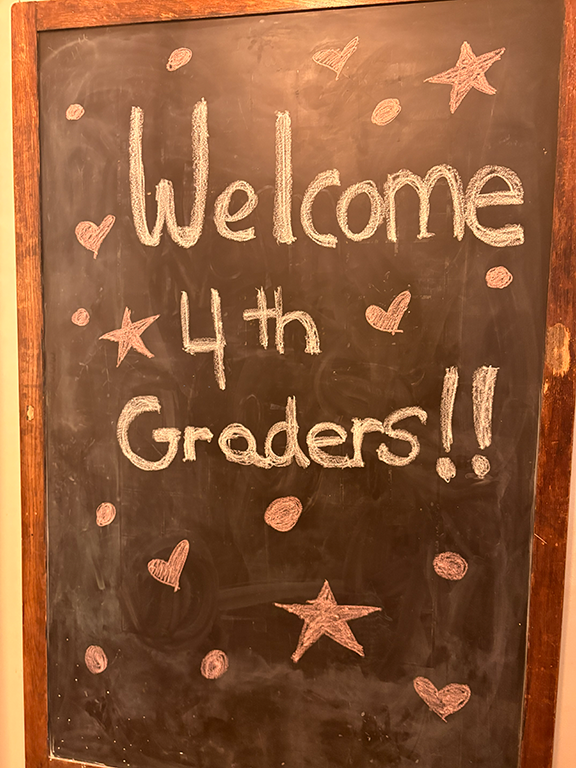 Sign welcoming fourth-graders