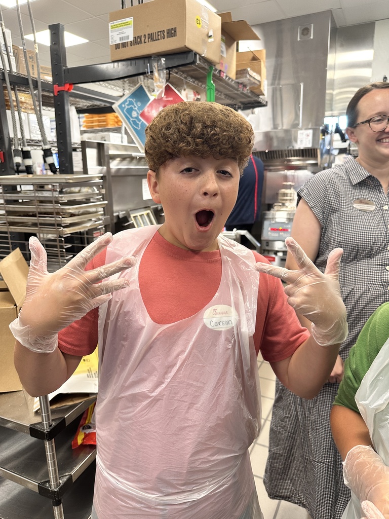Kids getting tour of restaurant