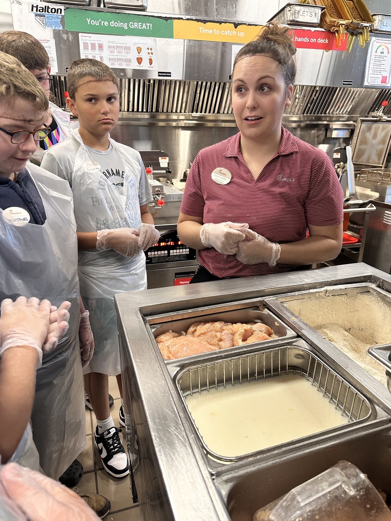 Kids getting tour of restaurant