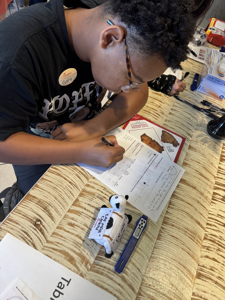 Boy filling out a survey