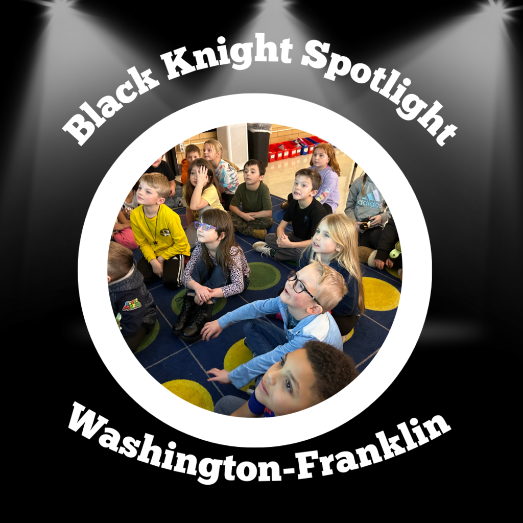 students looking at the teacher in class