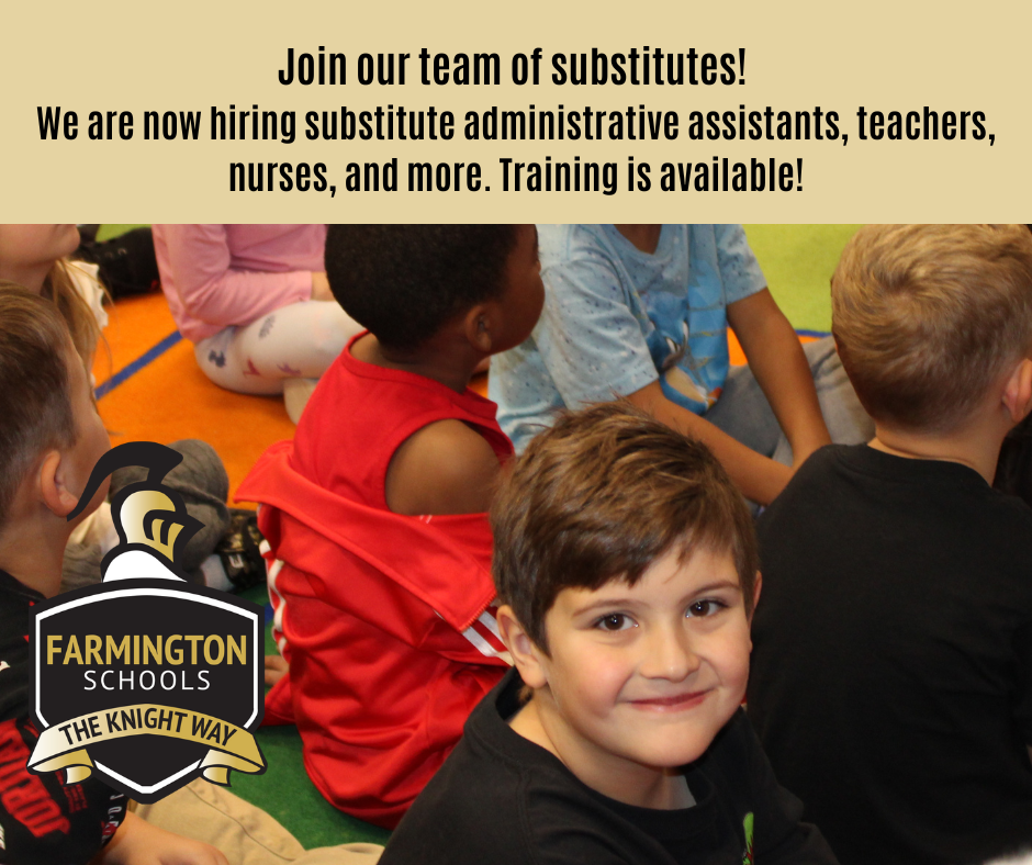 Kindergarten student in class smiling at camera
