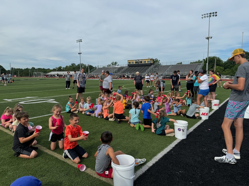 Kids playing a relay race 
