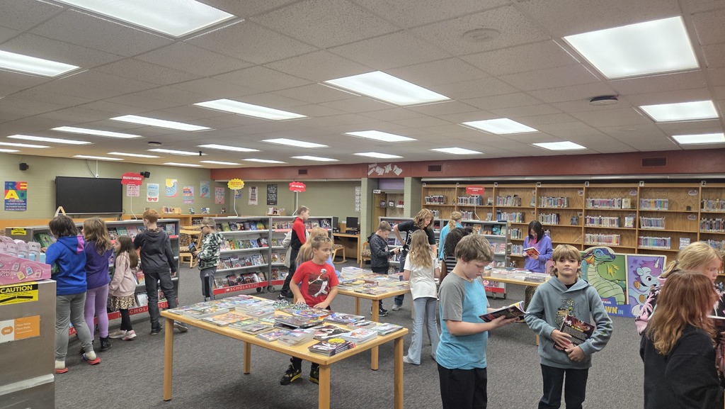 book fair with kids picking out books