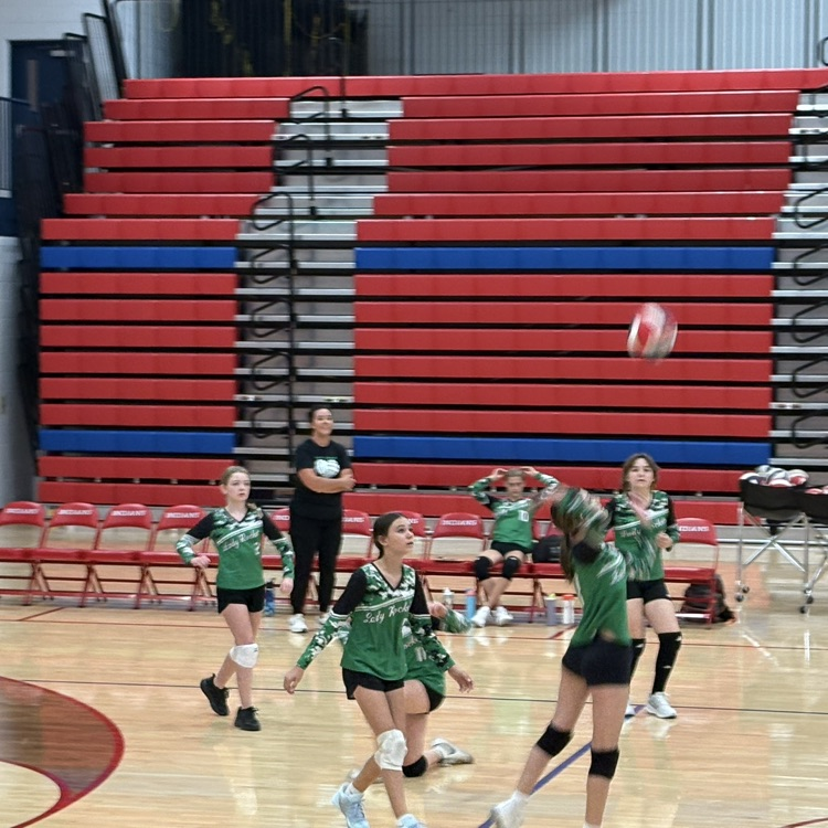 Rockets spike the ball.