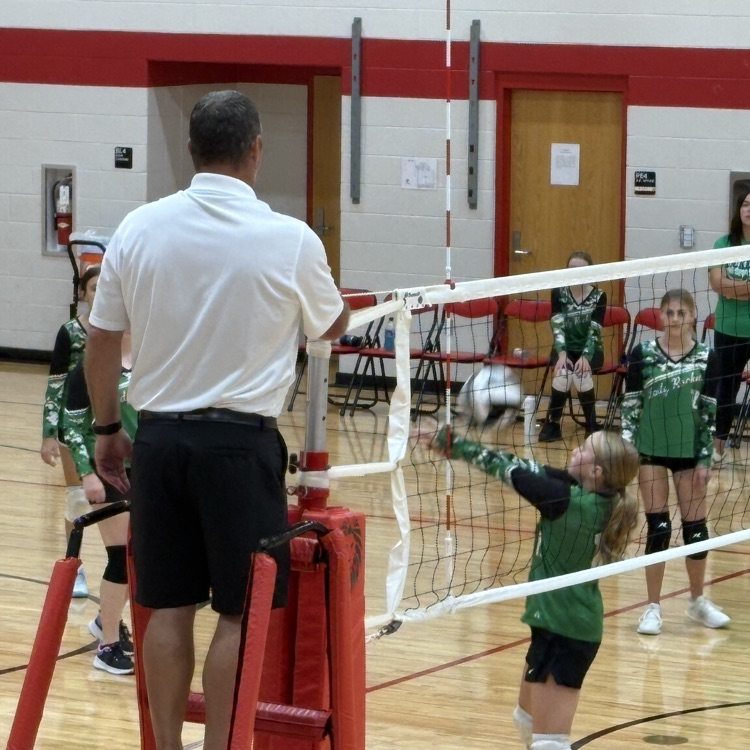 Rockets bump the ball at the net