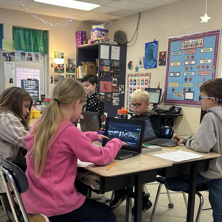 Students working hard in 4th grade on their project!