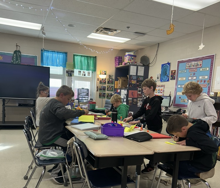 Students working hard in 4th grade on their project!