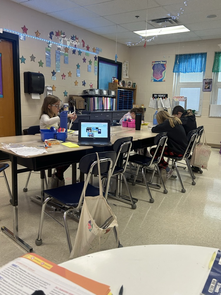 Students working hard in 4th grade on their project!