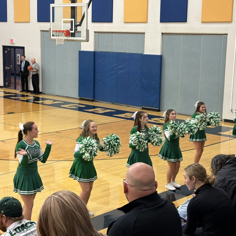 Cheerleaders pumping up the crowd