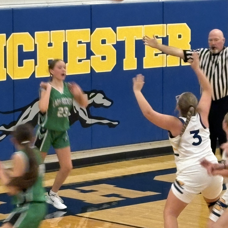 Rockets inbound the ball under the basket