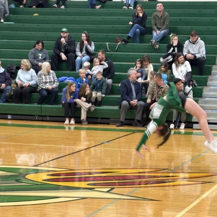 Rocket cheerleader doing backflips