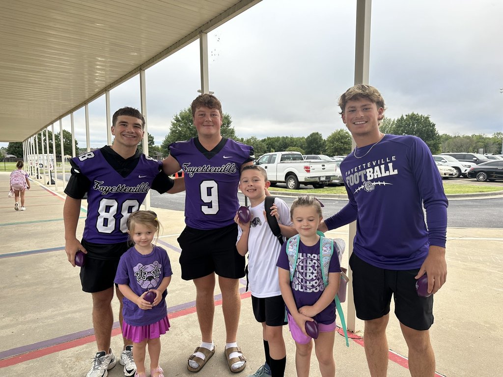 FHS Bulldog Football players and Holcomb Hornets