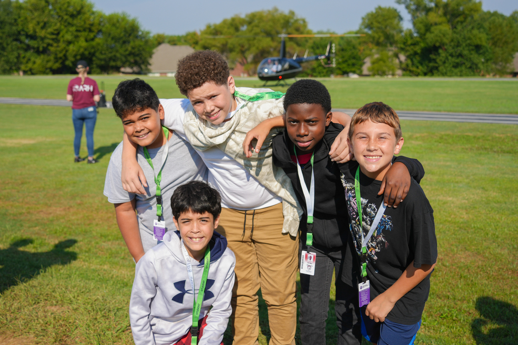 Holt Middle School science students experienced an unforgettable lesson on energy today! Airo (Arkansas Helicopters) pilots landed a helicopter right on campus and students were able to explore it up close. 