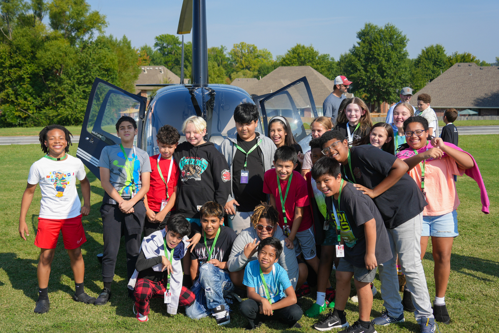 Holt Middle School science students experienced an unforgettable lesson on energy today! Airo (Arkansas Helicopters) pilots landed a helicopter right on campus and students were able to explore it up close. 