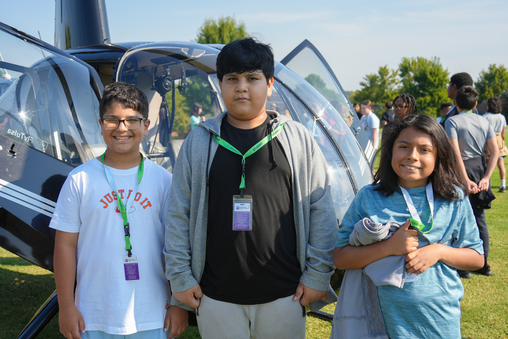 Holt Middle School science students experienced an unforgettable lesson on energy today! Airo (Arkansas Helicopters) pilots landed a helicopter right on campus and students were able to explore it up close. 