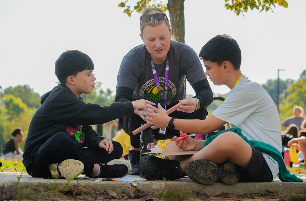 Students from John L Colbert Middle School Outdoor Adventure program teamed up with Fayetteville High School’s Aerodynamics and Space team at Kessler Park for an exciting hands-on experience!
