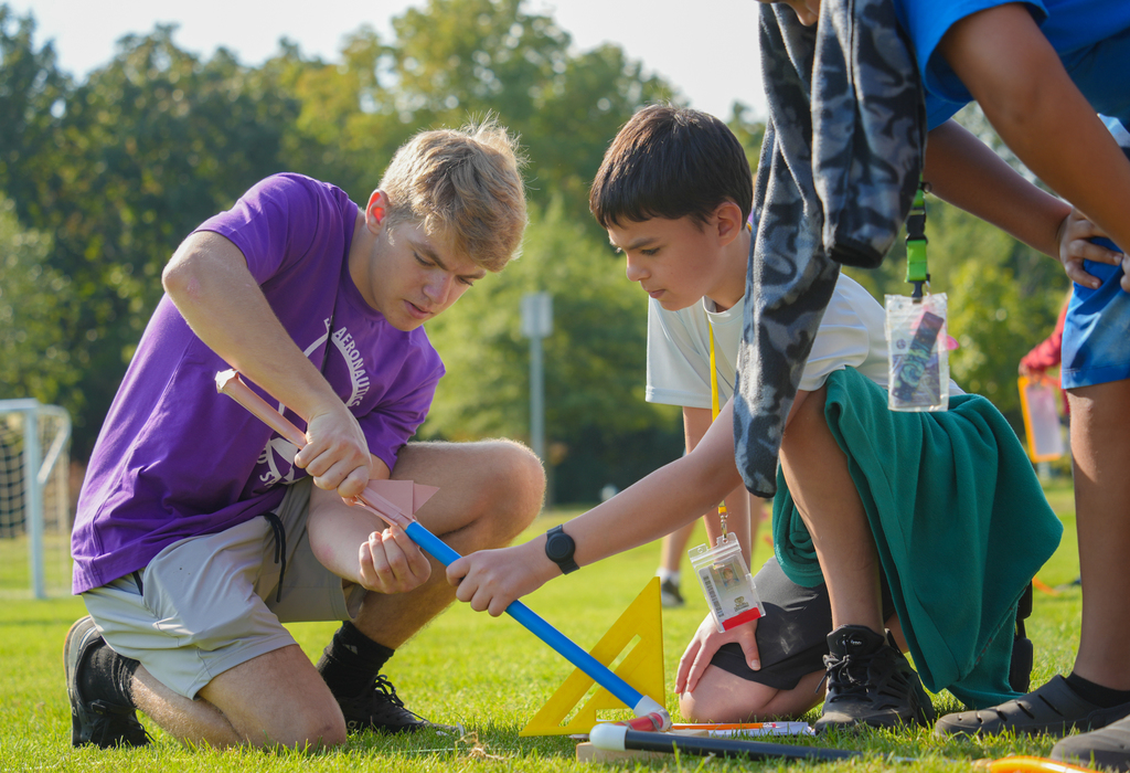 Students from John L Colbert Middle School Outdoor Adventure program teamed up with Fayetteville High School’s Aerodynamics and Space team at Kessler Park for an exciting hands-on experience!