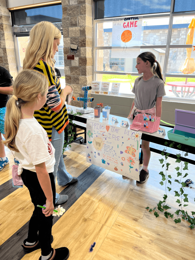 Teacher shopping at product booth