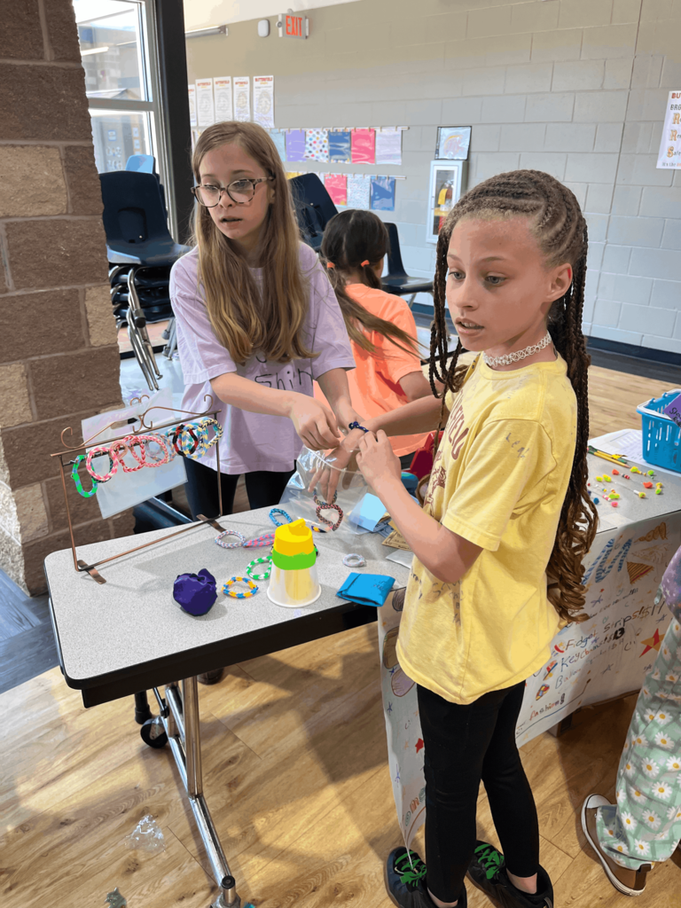 Student shopping at a product booth