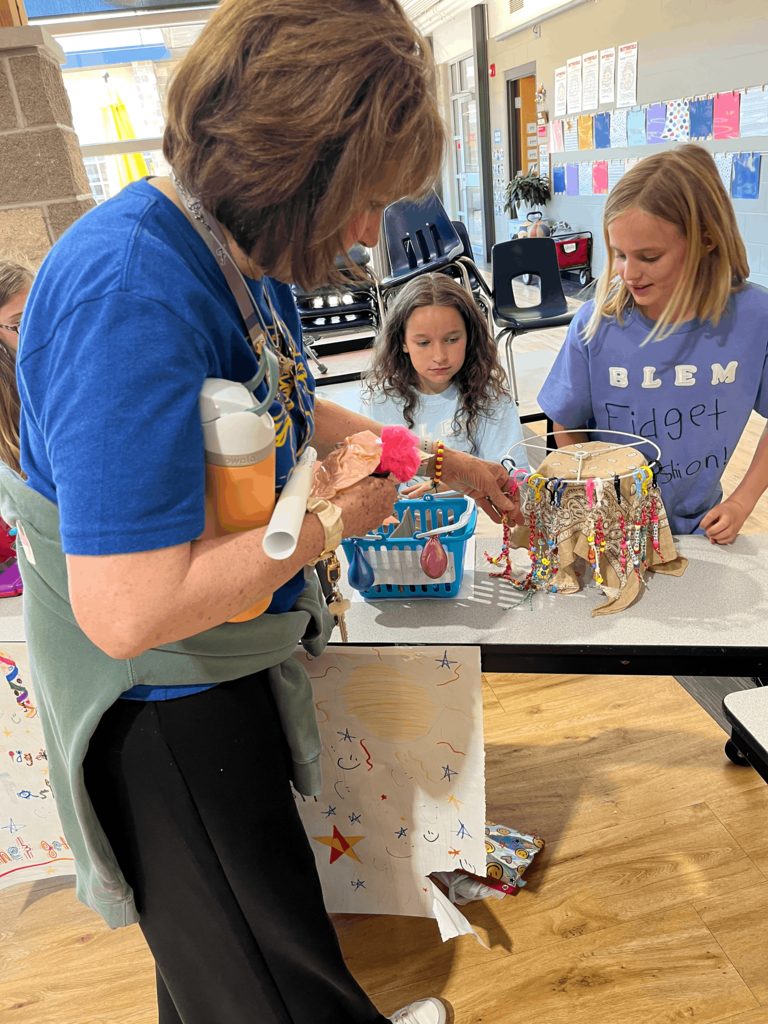 Teacher shopping at product booth
