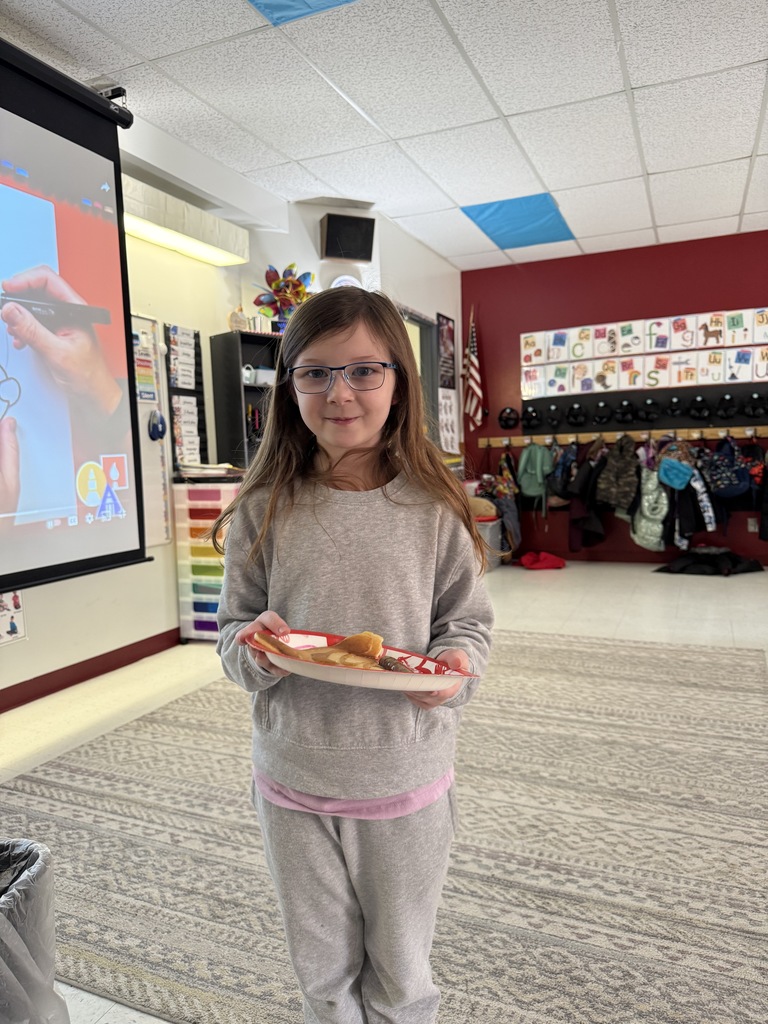 Mrs. Cominsky's class celebrates iReady goal!