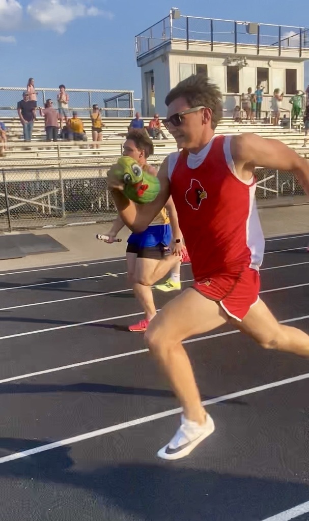 Logan Cole running down the home stretch during the thrower's relay.
