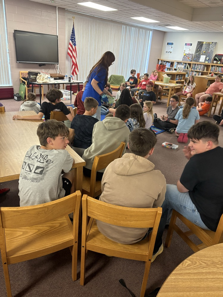 Students marvel while meteorites are created!