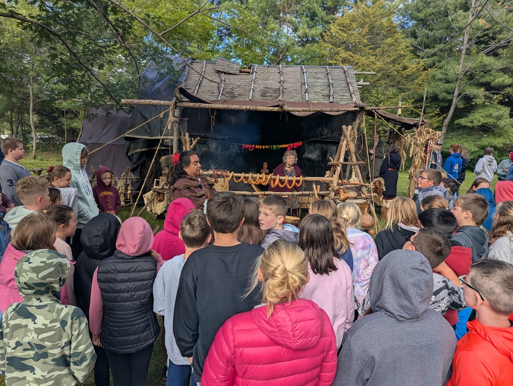 students view a long house and learn more about the life of people and life who lived in them
