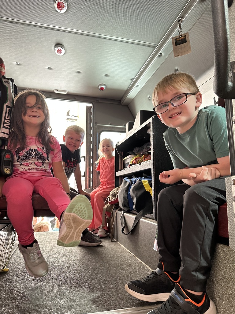 students look at the inside of the fire truck at the Fennimore fire station