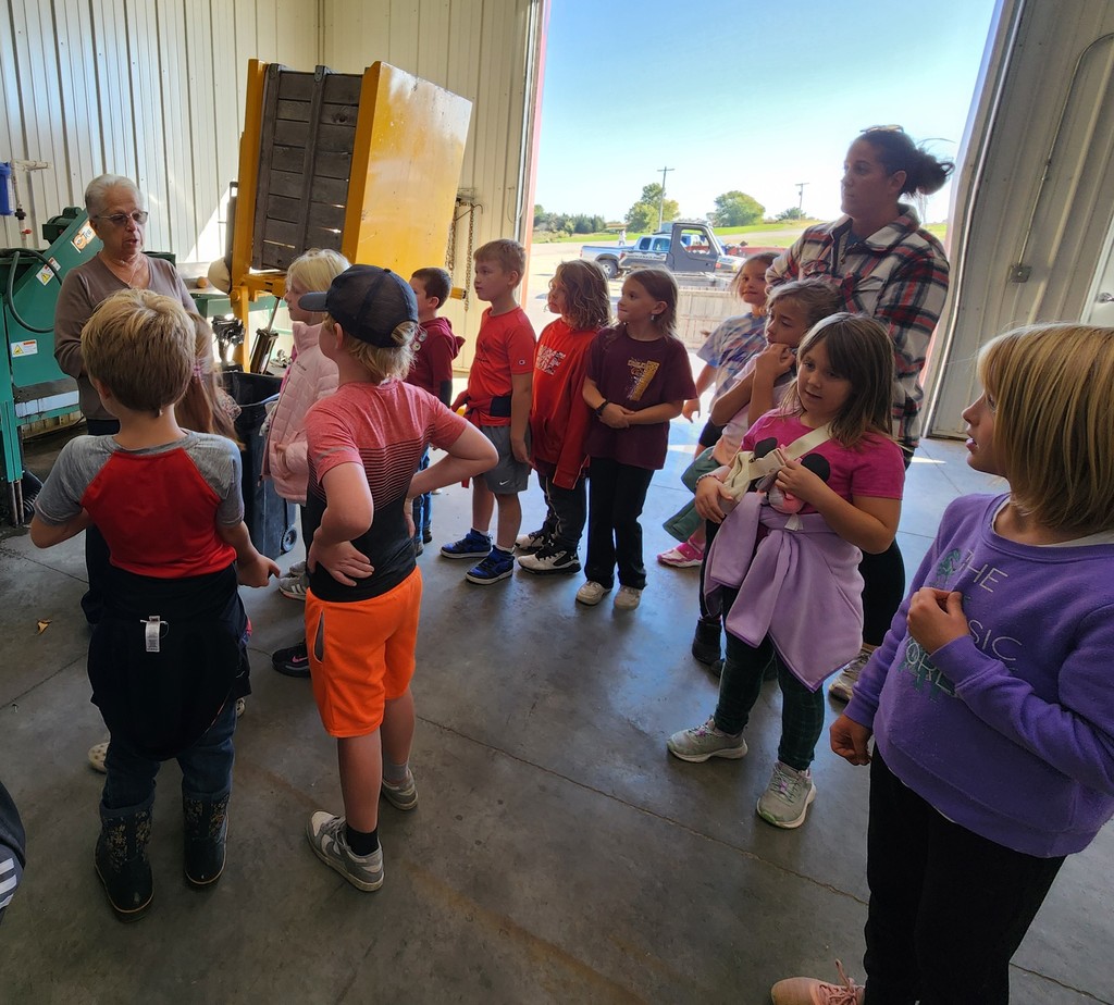 students learn about how the apple orchard works