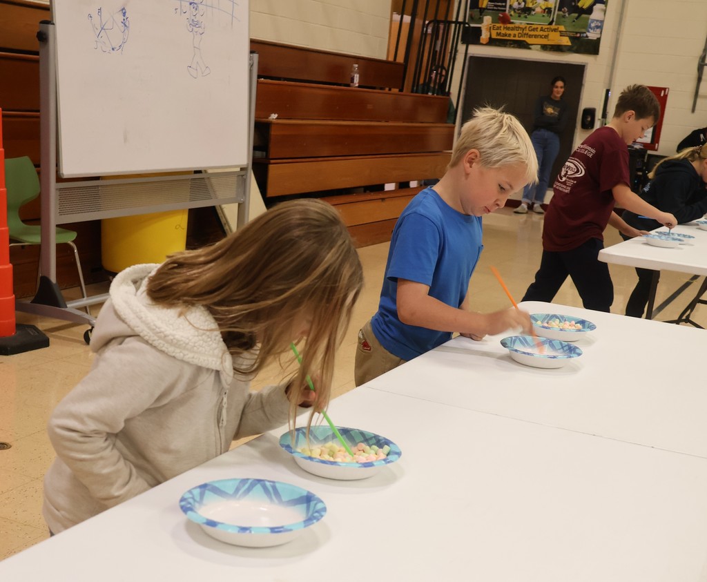 students compete in the marshmallow straw challenge