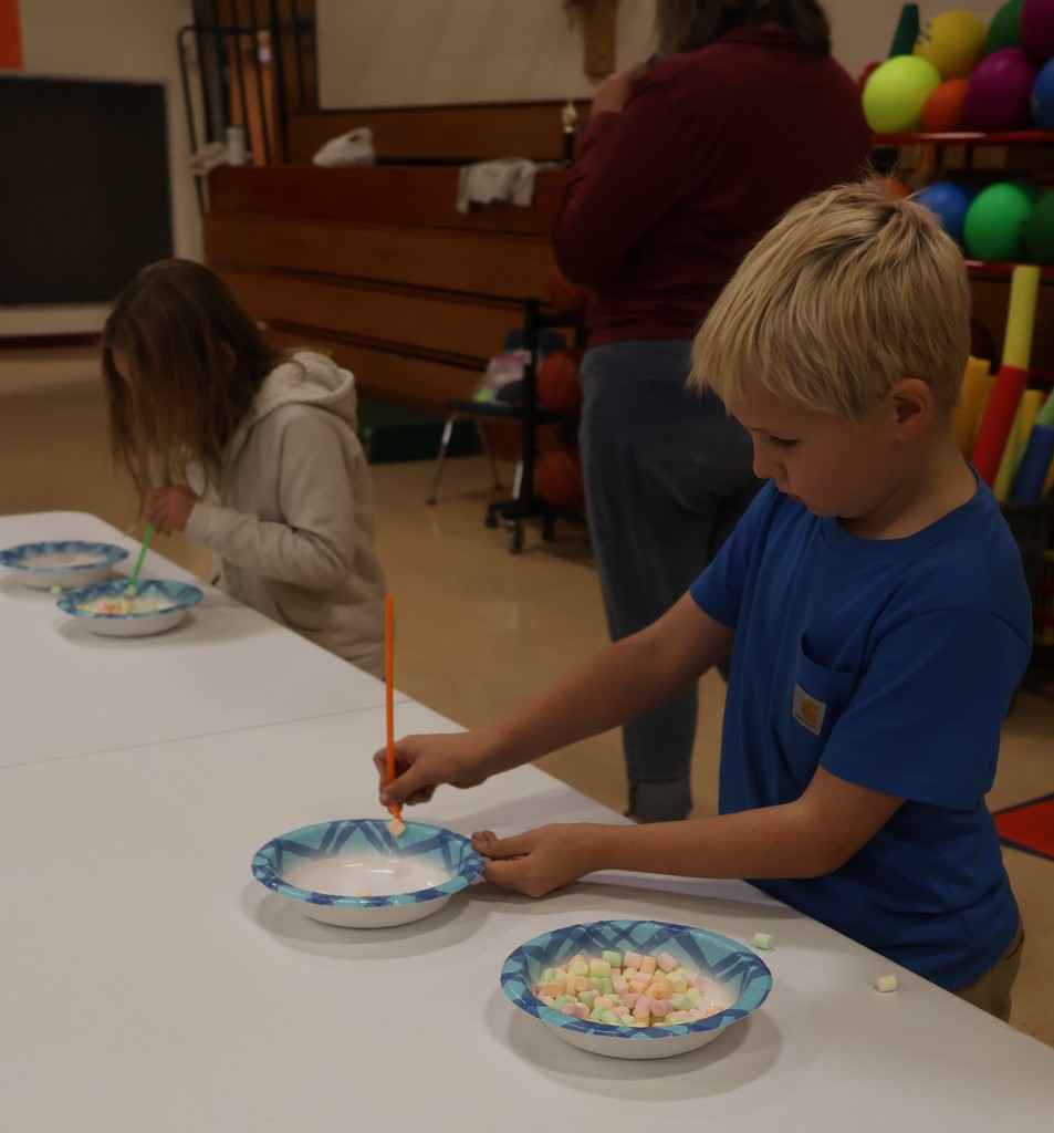 students competes in the straw marshmallow student challenge