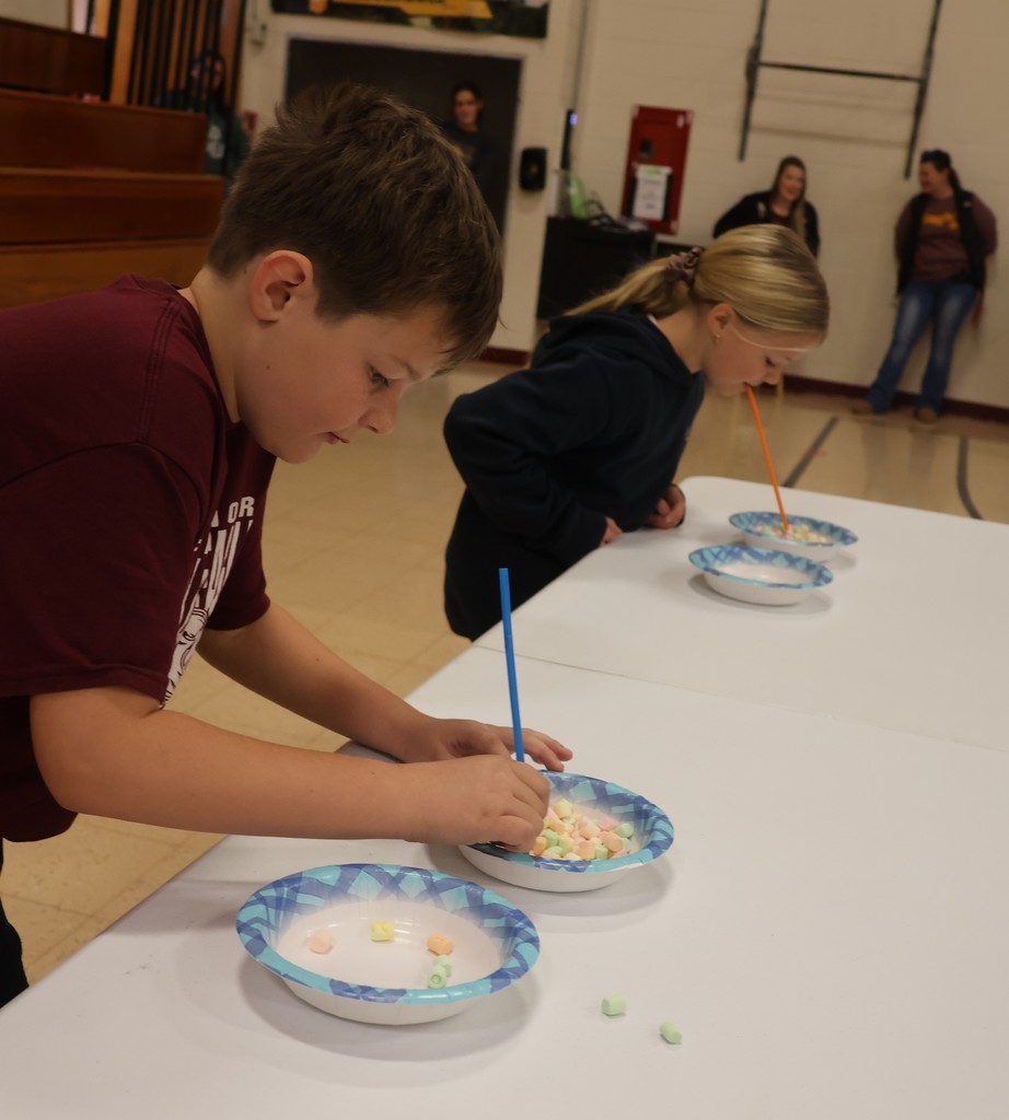 students competes in the straw marshmallow student challenge