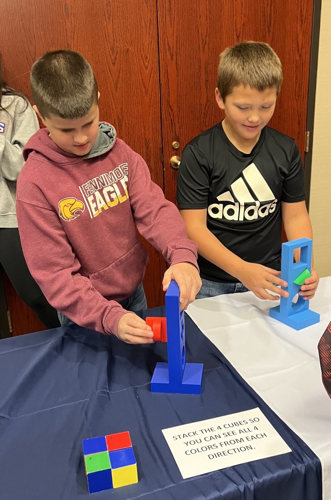 5th graders do math activities at UWP with cubes