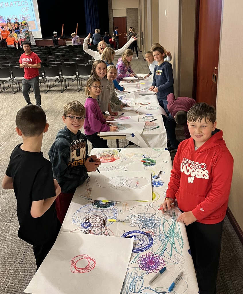 5th graders do math activities at UWP with spirographs