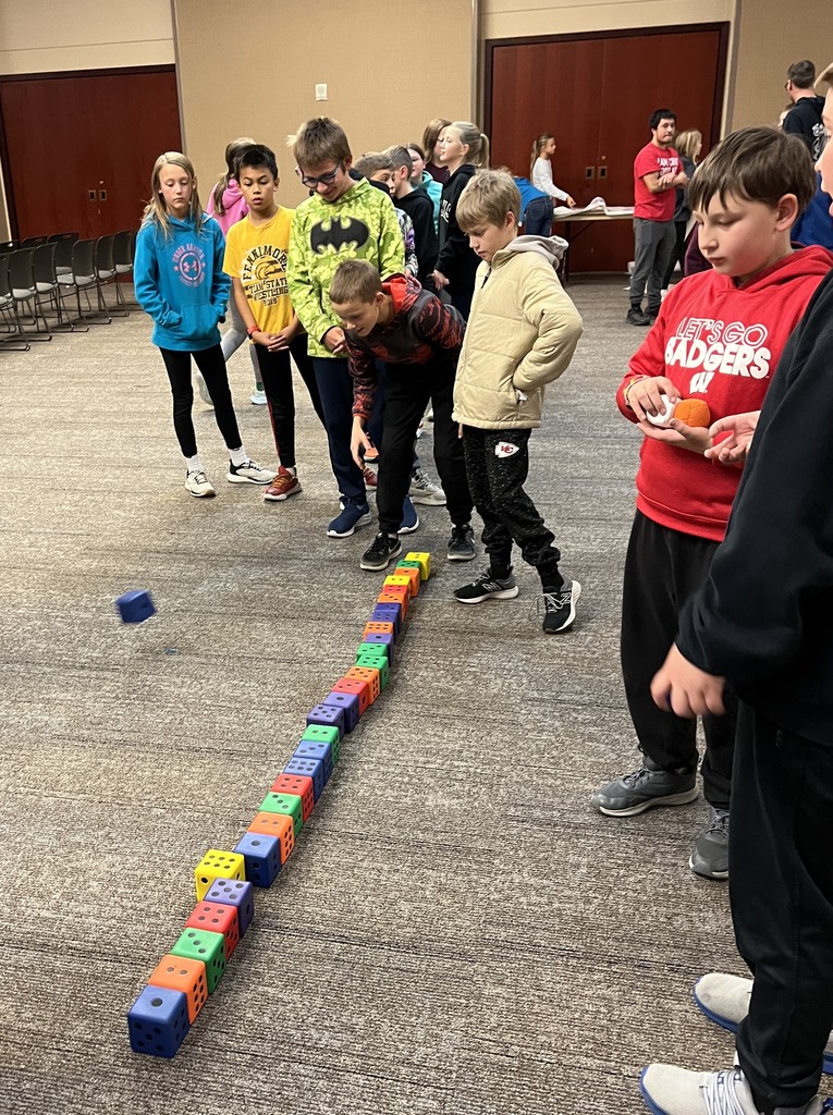 5th graders do math activities at UWP with dice