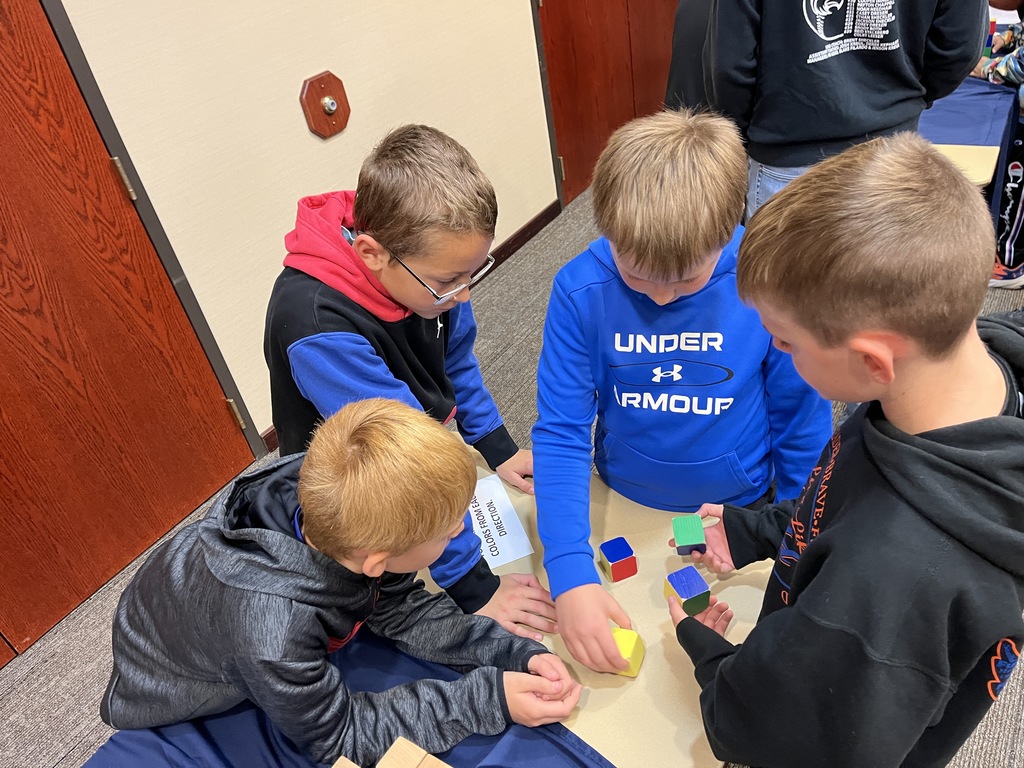 5th graders do math activities at UWP with cubes